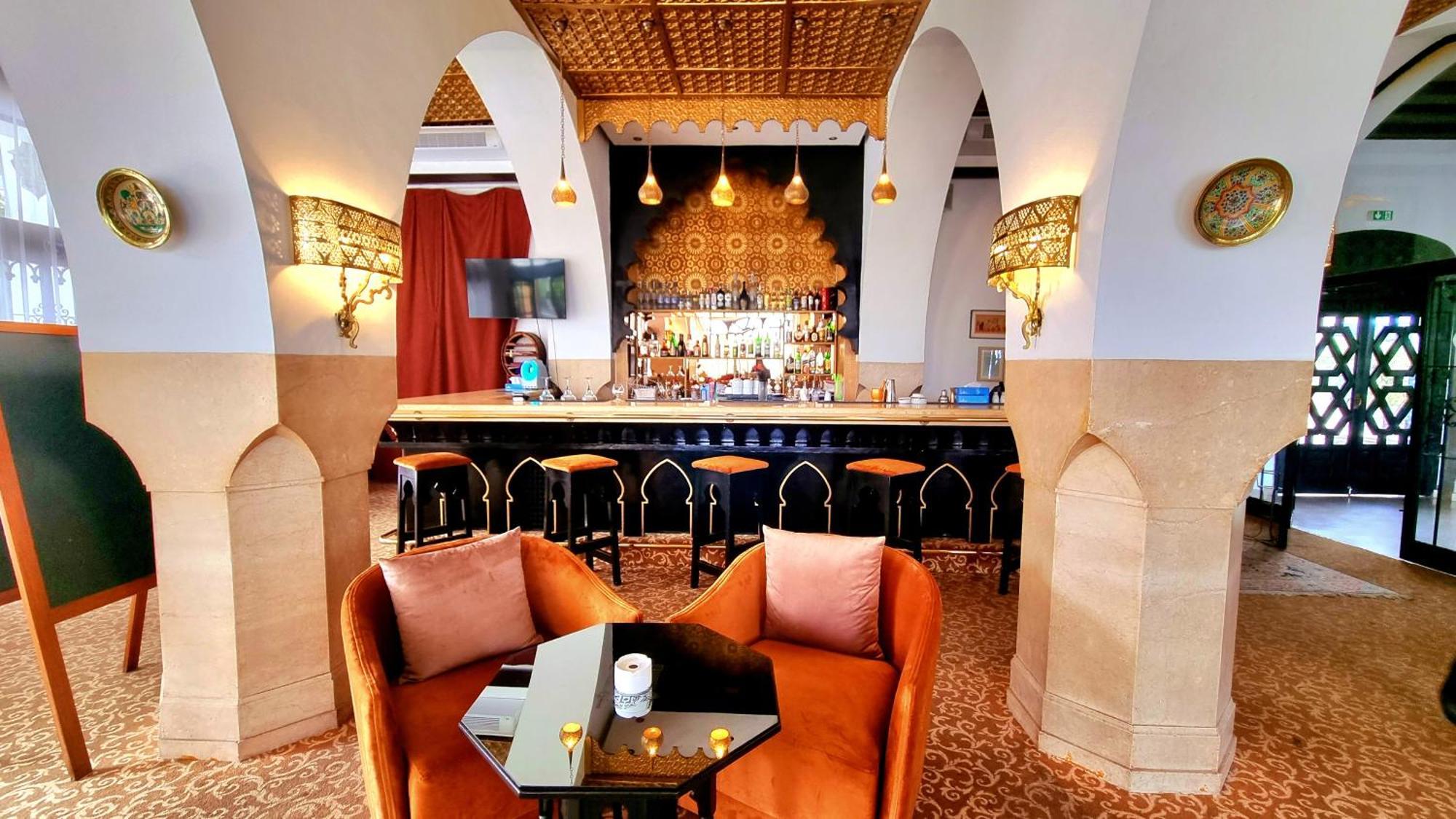 El Minzah Hotel Tangier Exterior photo The bar at the Hotel Excelsior